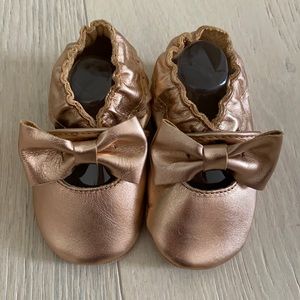 Rose gold baby shoe